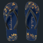 Elegant Bridesmaid Gold Floral Navy Blue Jandals<br><div class="desc">These elegant bridesmaid gold floral pattern navy blue flip flops have a dark blue background that is adorned with an intricate gold floral greenery pattern and customisable modern typography. The combination of the rich navy and the shimmering gold create an elegant and luxurious aesthetic. It's a beautiful gift for your...</div>