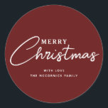 Elegant Burgundy Merry Christmas Script Name Classic Round Sticker<br><div class="desc">Add a moody touch to your holiday wrapping and more with these Elegant Burgundy Merry Christmas Script Name Classic Round Stickers. Each is designed with text "Merry Christmas" in white letters on dark burgundy. The font is hand script lettering mixed with simple easy to read letters. Personalised with family signature...</div>