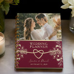 Elegant Burgundy Wedding Planner<br><div class="desc">Embark on your journey to wedded bliss with our captivating red burgundy wedding planner, exuding rustic charm and bohemian flair. Delicately adorned with floral motifs and modern chic elegance, this planner features a romantic rope heart accent and intricate gilded gold floral lace detailing. Complete with a personal touch, there's a...</div>