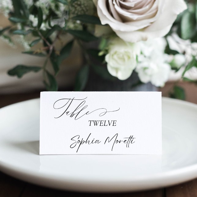 Elegant Calligraphy Black & White Classic Wedding Place Card (This wedding place card features an elegant calligraphy script font and a minimalist design)