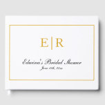 Elegant Calligraphy Gold Monogram Bridal Shower Guest Book<br><div class="desc">Elegant bridal shower guest book with a simple design featuring your two initial monogram in faux gold and your name, event title and date in calligraphy, inside of a border, over a white background. A chic and stylish design that is timeless. Display this classy guest book on your coffee table...</div>