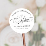 Elegant Calligraphy Wedding Classic Round Sticker<br><div class="desc">This calligraphy wedding sticker will make the perfect addition to your favours or envelopes to celebrate an over-the-top elegant wedding. The script font adds a touch of sophistication while the modern layout keeps it fresh and stylish. It's the perfect way to celebrate with your loved ones and your special day....</div>