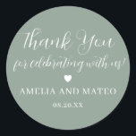 Elegant Calligraphy Wedding Thank You Favour Classic Round Sticker<br><div class="desc">The perfect little something to seal your wedding favour box or thank you note. The thank you sentiment is written in a playful script font then your name and wedding date are in a classic serif text. A sweet heart separates them. This item is part of the Elegant Minimalist Wedding...</div>