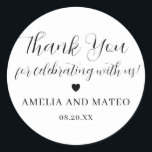 Elegant Calligraphy Wedding Thank You Favour Classic Round Sticker<br><div class="desc">The perfect little something to seal your wedding favour box or thank you note. The thank you sentiment is written in a playful script font then your name and wedding date are in a classic serif text. A sweet heart separates them. This item is part of the Elegant Minimalist Wedding...</div>