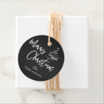 Elegant Chalkboard Christmas Tree Merry Christmas Favour Tags<br><div class="desc">Elegant Chalkboard Christmas Tree Merry Christmas Favour Tags  . Customise it by changing the names  . The design has Merry Christmas written in pretty font on a chalkboard background along with the names of the couple.  For any further customisation ,  feel free to contact me at mypaperlove2021@gmail.com</div>