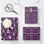 Elegant Christmas Ornament & Mandala Pattern plum Wrapping Paper Sheet<br><div class="desc">Gift wrap set with three designs that share the same colour scheme, with purple being the main colour: the first is a traditional Christmas tree decoration with the phrase Merry Christmas in white, the second is a penrose style mandala pattern and the third is a geometric pattern. The three wrapping...</div>
