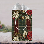 Elegant Classic Plaid Red Poinsettias Holly & Gold Medium Gift Bag<br><div class="desc">This stunning gift bag features a classic plaid design in rich festive colours, beautifully accented with lush poinsettias, holly berries, and gold ornaments. The elegant design is perfect for adding a sophisticated and festive touch to any gift. Available in multiple sizes to fit all your holiday gifting needs. A touch...</div>
