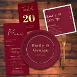 Elegant Classy Burgundy Gold Modern Chic Wedding Paper Plate<br><div class="desc">Make your wedding reception even more memorable with these elegant and modern paper plates. The bold burgundy background sets the perfect stage for the luxury gold calligraphy, creating a sophisticated and eye-catching design. The simple and versatile design allows you to coordinate with any wedding theme, while the customisation options let...</div>