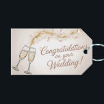 Elegant "Congratulations on Your Wedding"  Gift Tags<br><div class="desc">An elegant and celebratory image featuring a beautiful greeting card design. It shows two champagne flutes toasting,  accompanied by a festive stream of golden glitter and delicate petals. The text "Congratulations on your Wedding!" is written in a graceful,  flowing script.</div>