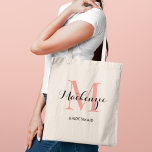 Elegant Coral Pink Custom Wedding Bridesmaid Name Tote Bag<br><div class="desc">Elegant custom wedding tote bag features a personalised monogram typography design with modern calligraphy script name and serif monogram initial in coral / salmon pink and black colours. Includes custom text for a bridal party title like "BRIDESMAID" or other preferred wording.</div>