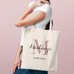 Elegant Dusty Rose Monogram Bridesmaid Tote Bag<br><div class="desc">Soft and romantic,  this elegant tote features a dusty rose monogram initial with a personalized name in delicate script and the bridal party role in refined type below. A beautiful monogram keepsake that complements blush and mauve wedding color schemes. Name,  initial,  and role are fully customizable.</div>