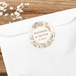 Elegant Earthy Floral Cream Wedding Favour Classic Round Sticker<br><div class="desc">This lovely favour sticker design features beautiful neutral colour florals with your names and wedding date. This timeless design is an excellent choice for many styles of events, from classic to boho. Customised favour labels make a wonderful addition to your wedding reception or bridal shower decor... and adds that extra...</div>