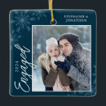 Elegant Engaged Christmas Snowflakes Blue Ceramic Ornament<br><div class="desc">This dark blue square Christmas ornament is a perfect gift for the newly engage couple. The design features a photo frame with handwritten text "Engaged" and is accented with light blue snowflakes on a dark blue background. Personalise with a pictures of the couple,  their names and year.</div>