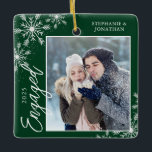 Elegant Engaged Christmas Snowflakes Green Ceramic Ornament<br><div class="desc">This square Christmas ornament is a perfect gift for the newly engage couple. The design features a photo frame with handwritten text "Engaged" and is accented with light grey snowflakes on a dark green background. Personalise with a pictures of the couple,  their names and year.</div>