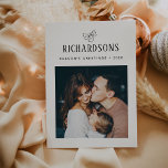 Elegant Family Photo and Name | Season's Greetings Holiday Card<br><div class="desc">This simple and minimalist, elegant black and white holiday card features your personal photo on the front, and an additional photo on the back, for a total of two of your favourite family photos. Classic calligraphy along with modern text for your family name add a stylish touch and says "Season's...</div>