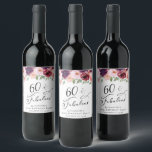 Elegant Floral 60th Birthday Party Wine Label<br><div class="desc">Elegant wine labels for her 60th birthday party that feature "60 & Fabulous" in a stylish script and watercolor bouquets of burgundy red,  blush pink and purple florals with light sage greenery. Personalise with her name and the party date.</div>