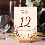 Elegant Floral Boho Fall in Love Wedding Table Number<br><div class="desc">Add a romantic and stylish touch to your reception décor with the Modern Elegant Boho Floral Fall in Love Wedding Table Number. Designed to complement warm autumn celebrations and bohemian wedding themes, this table number features beautiful floral accents inspired by fall colors and natural botanical elements. The modern layout paired...</div>