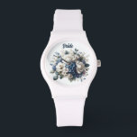 Elegant Floral Bride Watch - Wedding Day<br><div class="desc">Discover the ultimate wedding day timepiece with our Elegant Floral Bride Watch. Designed for the sophisticated bride, this stunning accessory features a delicate floral bouquet backdrop, beautifully paired with an elegant 'Bride' inscription. The pristine white strap complements any bridal gown, making it a timeless keepsake. It's not just a watch;...</div>