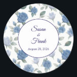 Elegant French Blue Rose Watercolor Wedding Classic Round Sticker<br><div class="desc">Add a sophisticated finishing touch to your save the date envelopes, wedding favours, or treat bags with this elegant round sticker. Featuring a stunning watercolor pattern of French blue roses and delicate greenery from our collection, this sticker perfectly seals your stationery suite with fine art style. The central white circle...</div>