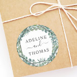 Elegant Geometric Greenery Wedding Monogram Classic Round Sticker<br><div class="desc">Elegant wedding favour stickers featuring modern organic style, combining a geometric diamond frame with botanical green foliage and beautiful typography. Watercolor greenery design includes a wreath of eucalyptus, leaves, and silver dollar eucalyptus branches in soft verdant shades of mint, green, olive, and muted blue green. Perfect for a spring or...</div>