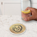 Elegant Gold Brushed Metal Monogram Stylish Coaster<br><div class="desc">Elegant,  unique monogrammed coaster in black and faux gold brushed metal. ASSISTANCE:  For help with design modification or personalisation,  colour change,  transferring the design to another product or if you would like coordinating items,  contact the designer BEFORE ORDERING via the Zazzle Chat MESSAGE tab or email at makeitaboutyoustore@gmail.com.</div>