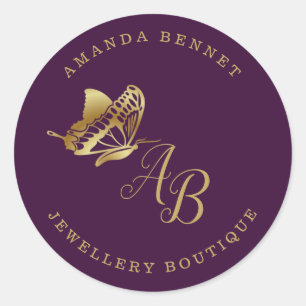 Elegant gold butterfly on purple, monogramed classic round sticker