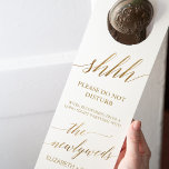 Elegant Gold Calligraphy Wedding Guest Door Hanger<br><div class="desc">These elegant gold calligraphy wedding guest door hangers are perfect for a simple wedding. The neutral design features a minimalist door hanger decorated with romantic and whimsical faux gold foil typography. Provide these door tags for your hotel guests so that they can get plenty of rest to recover from your...</div>