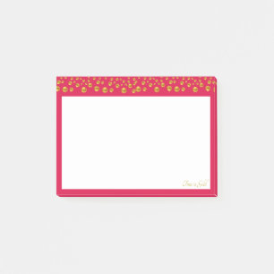 Elegant gold confetti on burgundy post-it notes