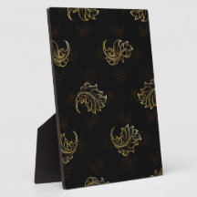 Elegant gold floral swirls on a black background