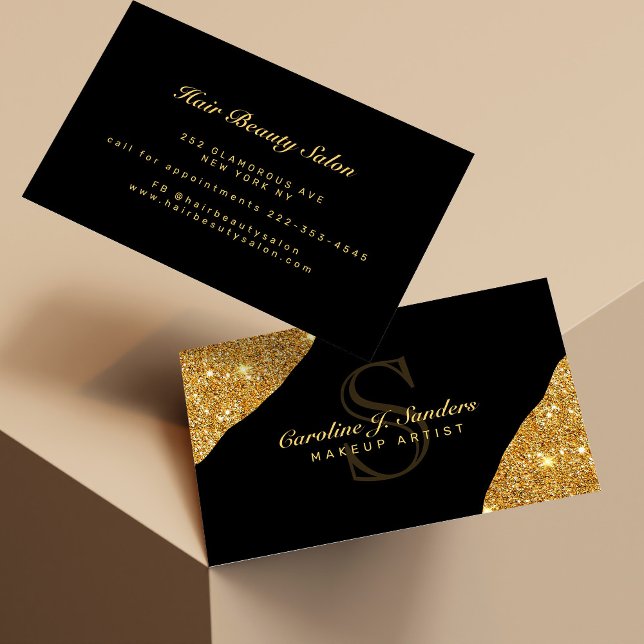 Elegant gold glitter black monogram makeup artist business card (Creator Uploaded)