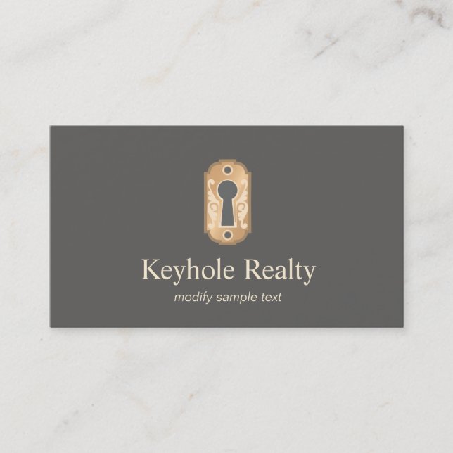Elegant Gold Key Hole Logo Real Estate Business Card (Front)