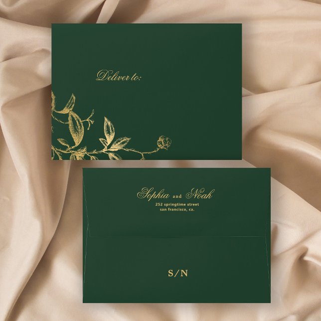 Elegant gold monogram floral dark green wedding envelope (Creator Uploaded)