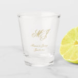 Elegant Gold Monogram Script Wedding Favour Shot Glass<br><div class="desc">These custom monogrammed wedding favour shot glasses feature an elegant faux gold calligraphy script for your monogrammed initials,  names,  and wedding date to personalise. Best of wishes for your wedding and marriage! Designed by Susan Coffey.</div>