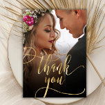 Elegant Gold Script 2 Photo Wedding Thank You Card<br><div class="desc">Modern Boho Chic Gold Calligraphy Script 2 Photo Wedding Thank You Card. Stylish wedding thank you template featuring a full vertical photo on the front with the text "Thank You" in a whimsical swirly hand lettering typography swash tail font script faux gold foil overlay on the picture. 2-sided card with...</div>