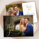 Elegant Gold Script 2 Photo Wedding Thank You Card<br><div class="desc">Elegant Chic Modern Boho Gold Calligraphy Script Wedding 2 Photo Thank You Card. Stylish wedding thank you template featuring a full vertical photo on the front with the text "Thank You" in a whimsical swirly hand lettering typography script swash tail font overlay on the picture and a reverse side one...</div>