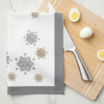 Elegant Gold & Silver Snowflakes Christmas Tea Towel<br><div class="desc">Kitchen towel with elegant sparkly silver glitter snowflakes on winter white background,  trimmed in silver grey.</div>