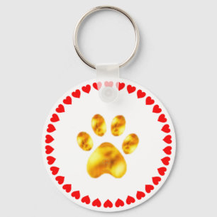 Elegant golden paw with hearts on white key ring