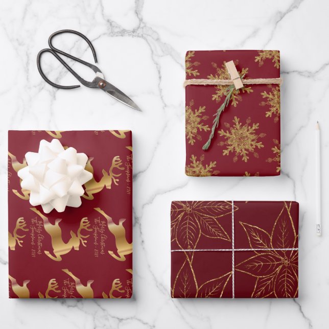 Elegant Golden Reindeers Snowflakes and Poinsettia Wrapping Paper Sheet (Front)