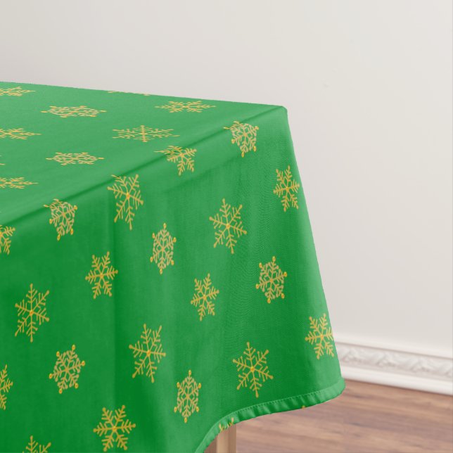 Elegant Golden Snowflake Pattern on Green Tablecloth (In Situ)