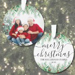 Elegant Greenery Merry Christmas Family Photo<br><div class="desc">Personalised Name Elegant Greenery Merry Christmas Script Family Photo Custom Ornament Dated. Create a personalised holiday keepsake with this elegant Christmas ornament, featuring a large family photo framed by lush botanical greenery. The top showcases a seamless white gradient that blends into pine branches, evergreen leaves, and red holly berries, offering...</div>