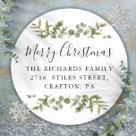 Elegant Greenery Merry Christmas Return Address Classic Round Sticker<br><div class="desc">Watercolor greenery frames elegant script Merry Christmas typography on these elegant return address stickers. Personalise with your family name and address. Designed by Thisisnotme©</div>