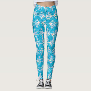 Elegant japanese sakura flowers on blue pattern leggings