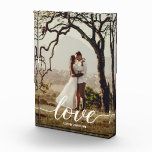 Elegant Love Script Wedding Photo Newlyweds Framed Block<br><div class="desc">Encase the moment your hearts united in a showcase of pure elegance with the Elegant Love Script Wedding Photo Newlyweds Framed Block from LD Design Loft. This exquisitely finished frame is a vessel for your cherished memories, a portal to the day two souls became one under the banner of love....</div>