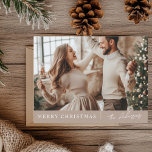 Elegant Merry Christmas Neutral Photo  Postcard<br><div class="desc">Celebrate the holiday season with this beautifully minimalistic Merry Christmas photo card in neutral tones. Perfect for adding a modern and timeless touch to your holiday greetings. Personalise with your family photo and custom name, creating a unique and elegant card that will be cherished by all your loved ones. Ideal...</div>