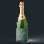 Elegant Merry Christmas Script Green Holiday Sparkling Wine Label<br><div class="desc">Festive Merry Christmas script lettering,  holiday bottle labels. Design features,  snowflake accent and whimsical white holiday typography quote on green background. Two template text lines for your message and name.</div>