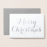 Elegant Merry Christmas Script Typography Silver Foil Card<br><div class="desc">Elegant Merry Christmas Silver Foil Greeting Card makes a great choice for wishing your family, friends and loved ones happy holidays! Real silver foil on front of card with "Merry Christmas" and frame border Inside of card is bold elegant black with simple holiday greeting Customise inside black background if you...</div>