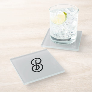 Elegant minimalist modern initial on grey glass coaster