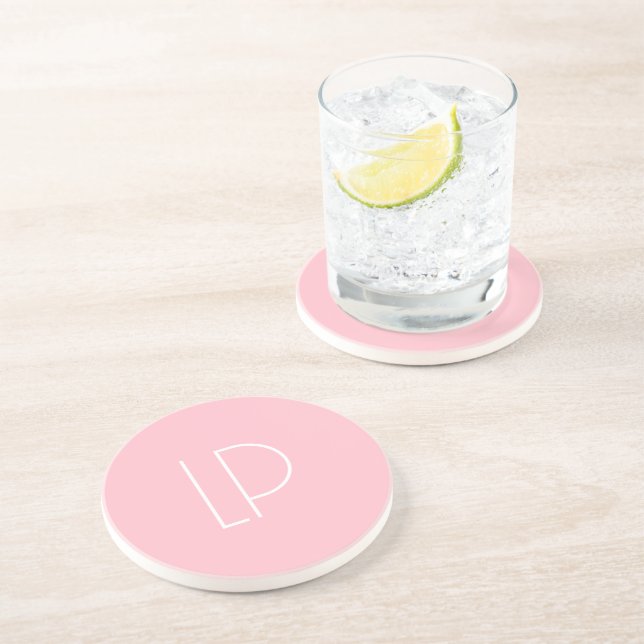 Elegant minimalist modern initial on pastel pink coaster (Side)