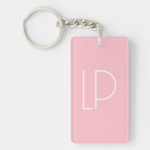 Elegant minimalist modern initial on pastel pink key ring