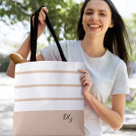 Elegant Modern Bold Stripes Monogram Neutral Brown Tote Bag<br><div class="desc">Elegant contemporary design features a mix of thick bands and thin stripes in crisp white and modern neutral light brown.  Add two or three monogrammed initials in stylish black script. Design repeats on back.  Custom colour requests accepted.</div>
